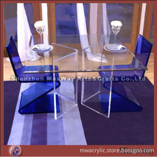 Elegant and modern acrylic dining blue chair and clear table